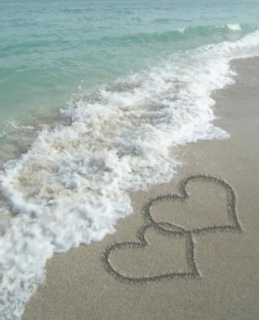 beach with hearts in sand